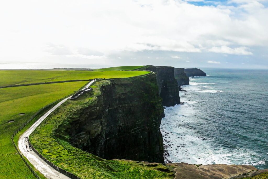 Aerial view Of Cliffs Of Moher, Cliff of Moher Ireland, Aerial view of the Cliffs of Moher on the west coast of Ireland, Ireland cliffs rock stone, Relax nature view, aerial nature sea view, Ireland Nature, Drone ireland