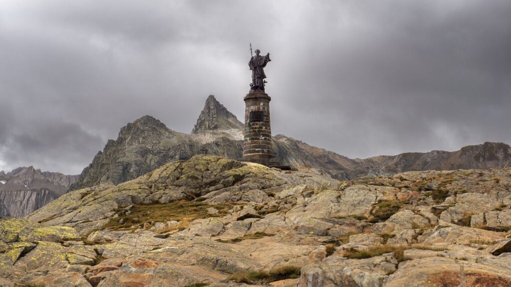 Statue of Saint Bernard at the Great St Bernard Pass (Col du Grand-Saint-Bernard) in the Swiss Alps.